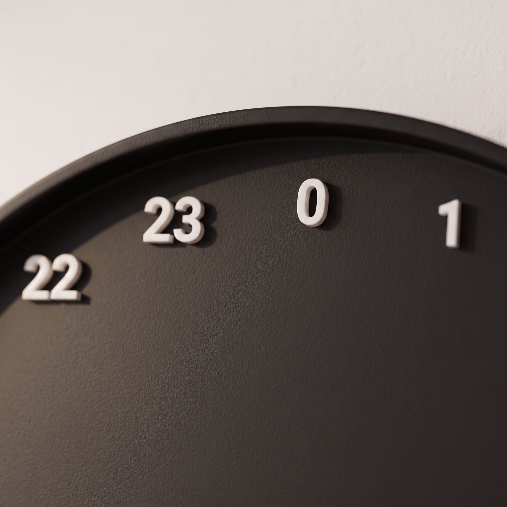 Raised numerals 22, 23, 0 and 1 at the top of the clock face
